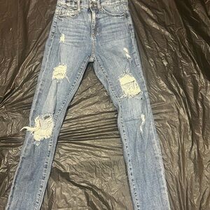 Sneak Peek Distressed Skinny Jeans in Blue